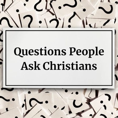 card layered on top of question marks